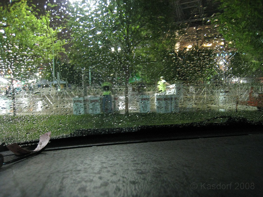 Flying Pig 2009 0300.jpg - 4:30 am race day... sitting on the start line in the Honda... just me and the guys setting up the trash containers.... and the rain, oh yeah, the rain.